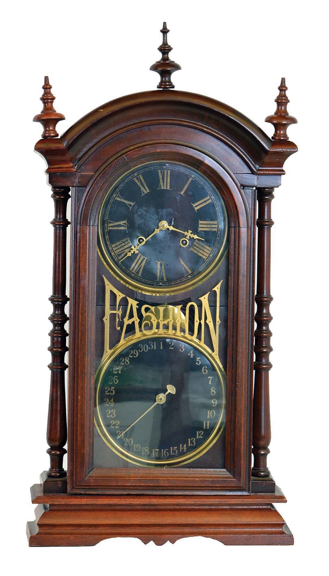 New Haven Clock Co., New Haven, Conn., "Fashion", 8 day, time and strike spring brass movement double dial shelf calendar clock. — Antique Clocks Price Guide