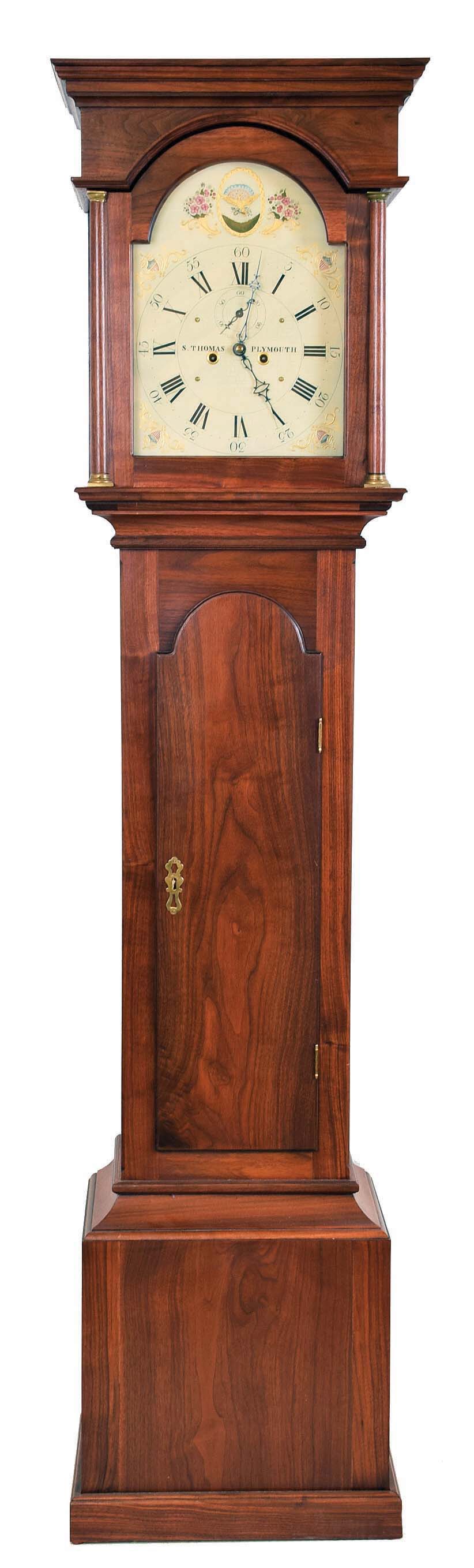 Seth Thomas Clock Co., Thomaston, Conn., period tall clock movement 8 day, time and strike, weight driven, in a reproduction walnut flat top case and painted metal dial, — Antique Clocks Price Guide