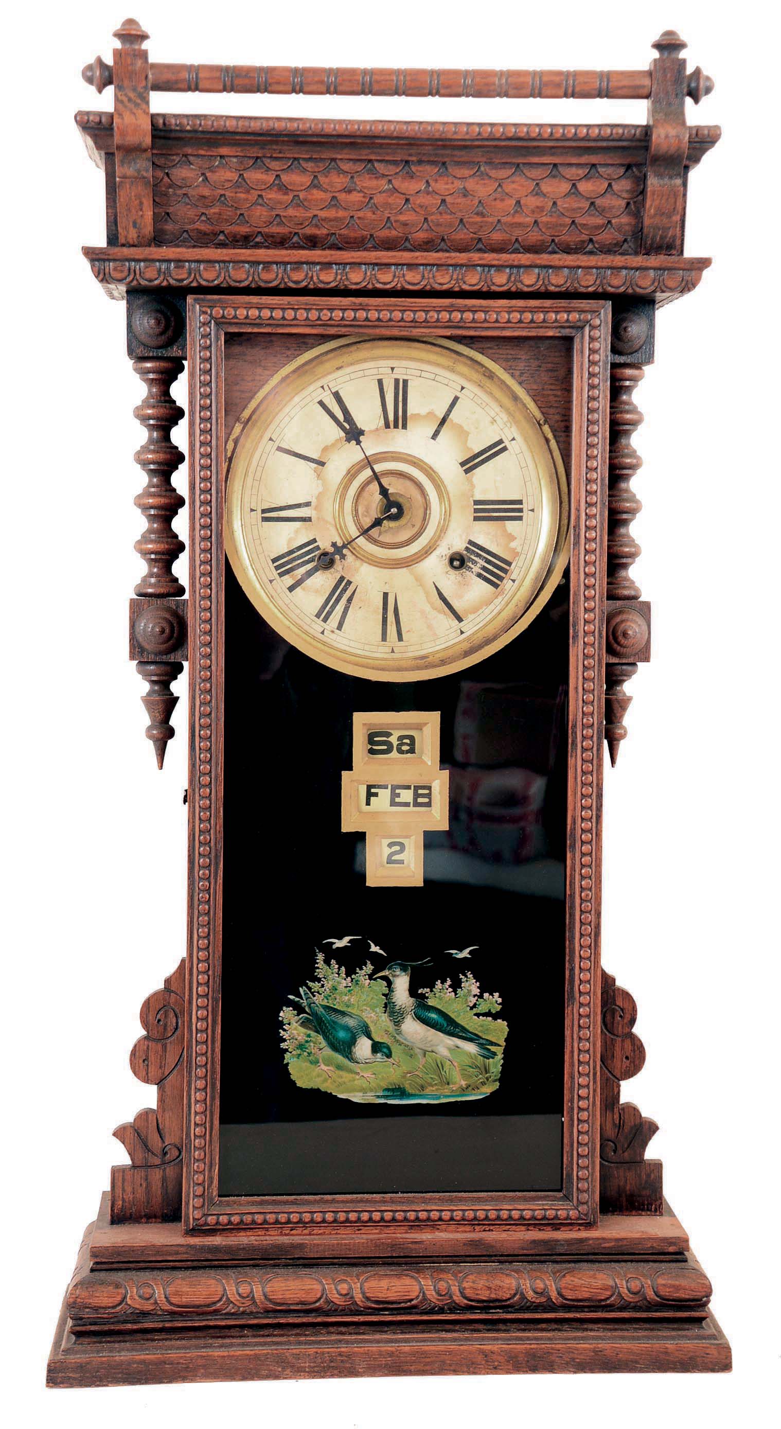 William L. Gilbert Clock Co., Winsted, Conn., "Oriental", 8 day, time and strike spring brass movement calendar shelf clock. — Antique Clocks Price Guide