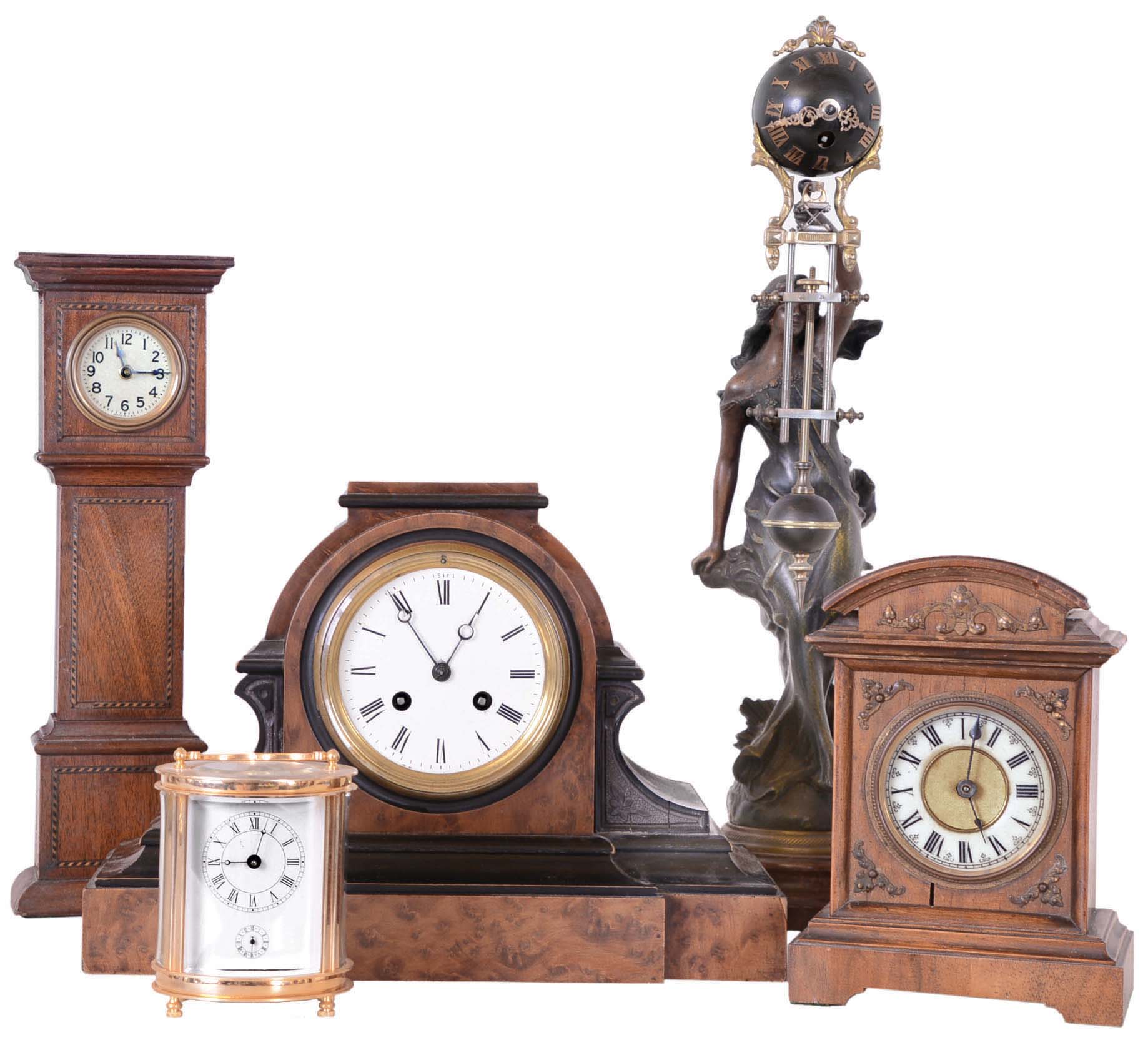 Clocks- 5 (Five): French wood 8 day time and strike tambour with Marti movement; ProClocks modern brass and glass 8 day time and alarm carriage; U.S.A. miniature 30 hour time only inlaid mahogany miniature tall clock; German walnut small time and alarm 30 hour bracket; and "Le Jour par A. Cadet" figural with swinging arm, also a modern Asian reproduction. — Antique Clocks Price Guide