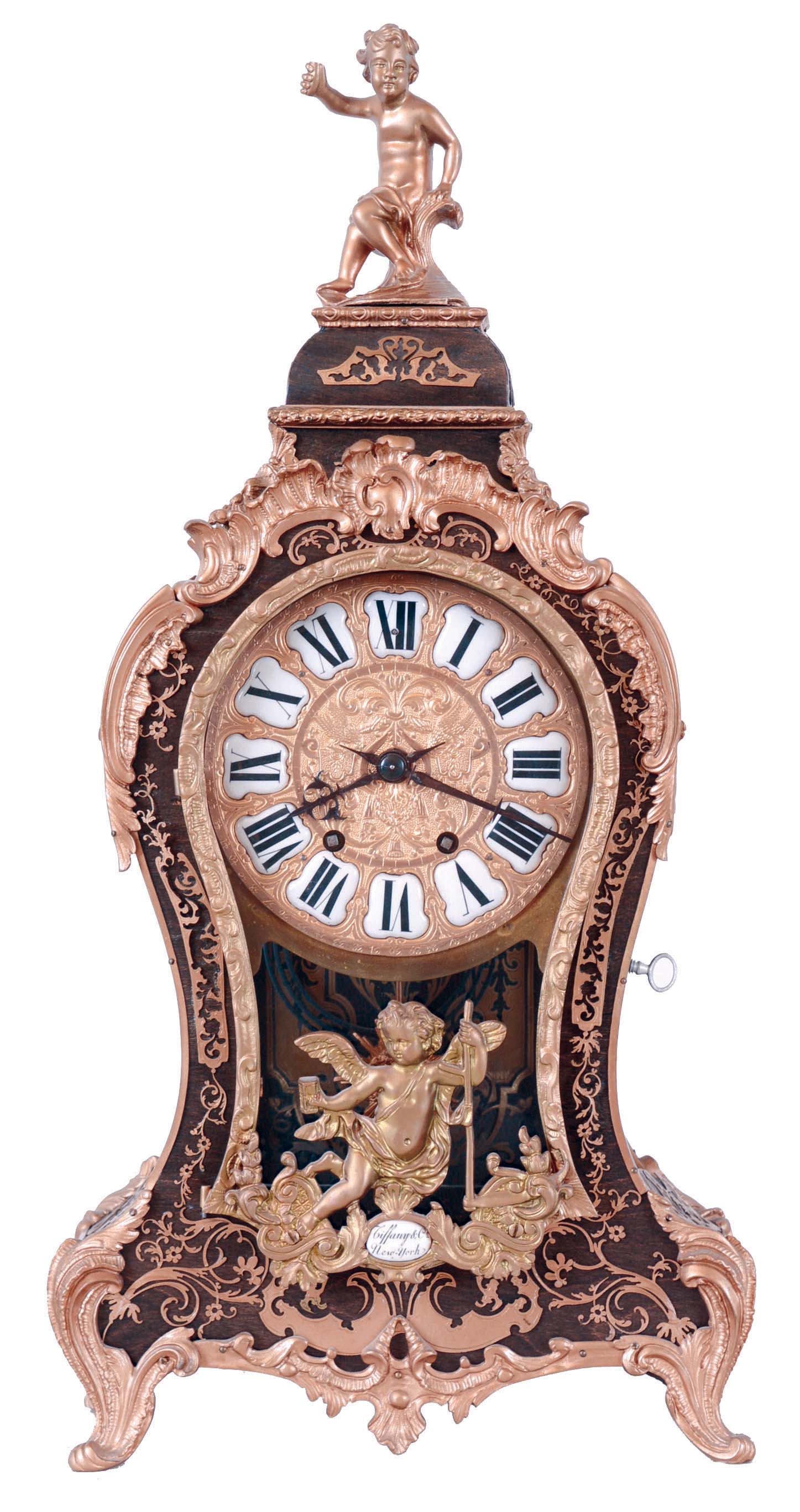 Tiffany &amp; Co. bracket clock in the Louis XV style, 8 days, time and strike, spring driven movement in a case mounted with cast ornaments in the rococo style and enamel plaque with Tiffany signature, the top with putto, brass dial with Roman numeral cartouches — Antique Clocks Price Guide