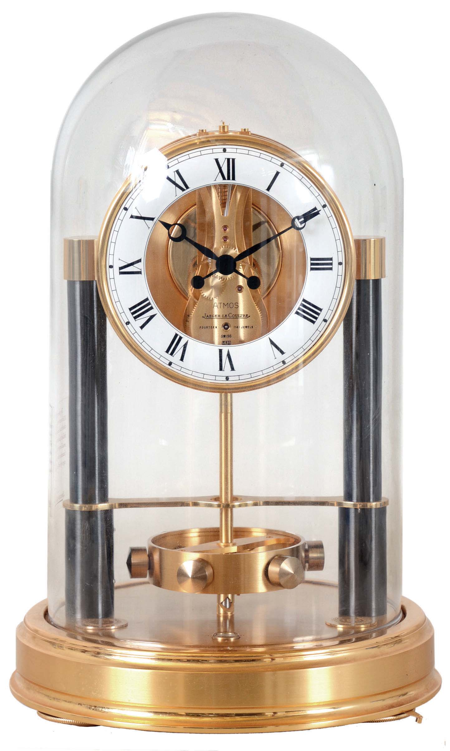 LeCoultre, Switzerland, "Atmos 150th Anniversary" mantel clock, gilt case and base with glass dome, Roman numeral white painted dial, black painted hands, 14 jewel cal. 540 movement, serial #600590, number 194 in the edition, with dome and papers — Antique Clocks Price Guide