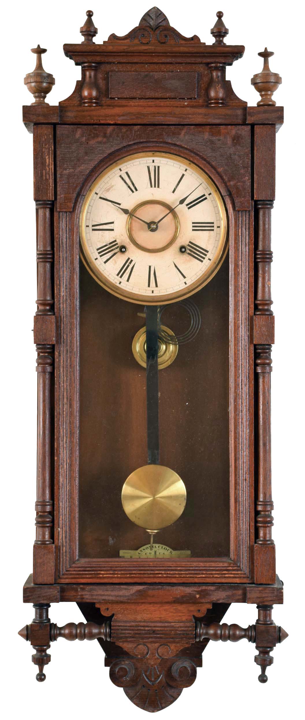 Clocks- 2 (Two): (1) New Haven Clock Co., New Haven, Conn., "Eclipse" wall hanging clock with a spring driven 8 day time and simple calendar movement in a solid oak case and made for the American Wringer Co., 99 Chambers St., NY. c1910. (2) Ansonia Clock Co., New York, NY, "Queen Elizabeth" wall hanging clock with a spring driven 8 day time &amp; half-hour strike movement in an oak case. c1880. — Antique Clocks Price Guide