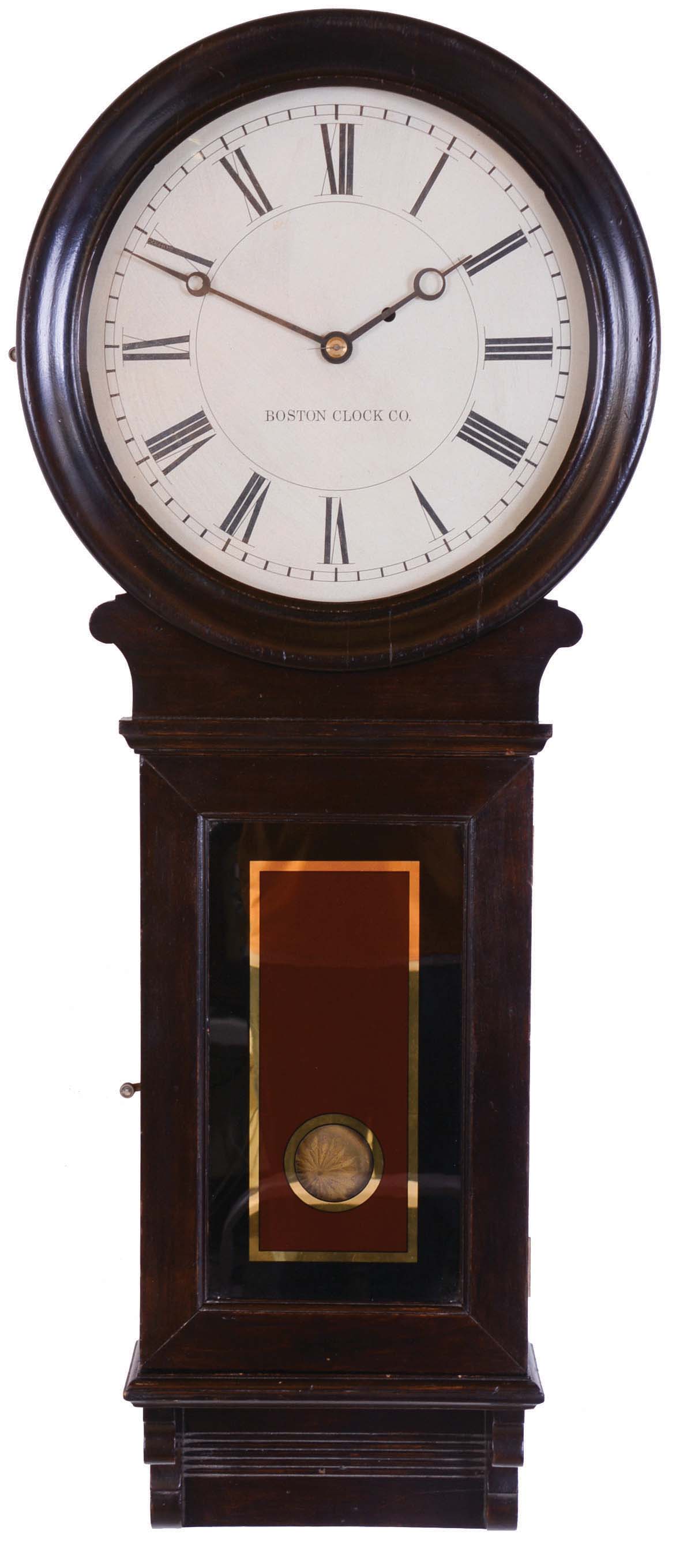 Boston Clock Co., Boston, Mass., wall hanging clock with a weight driven 8 day timepiece movement in a cherry case. — Antique Clocks Price Guide