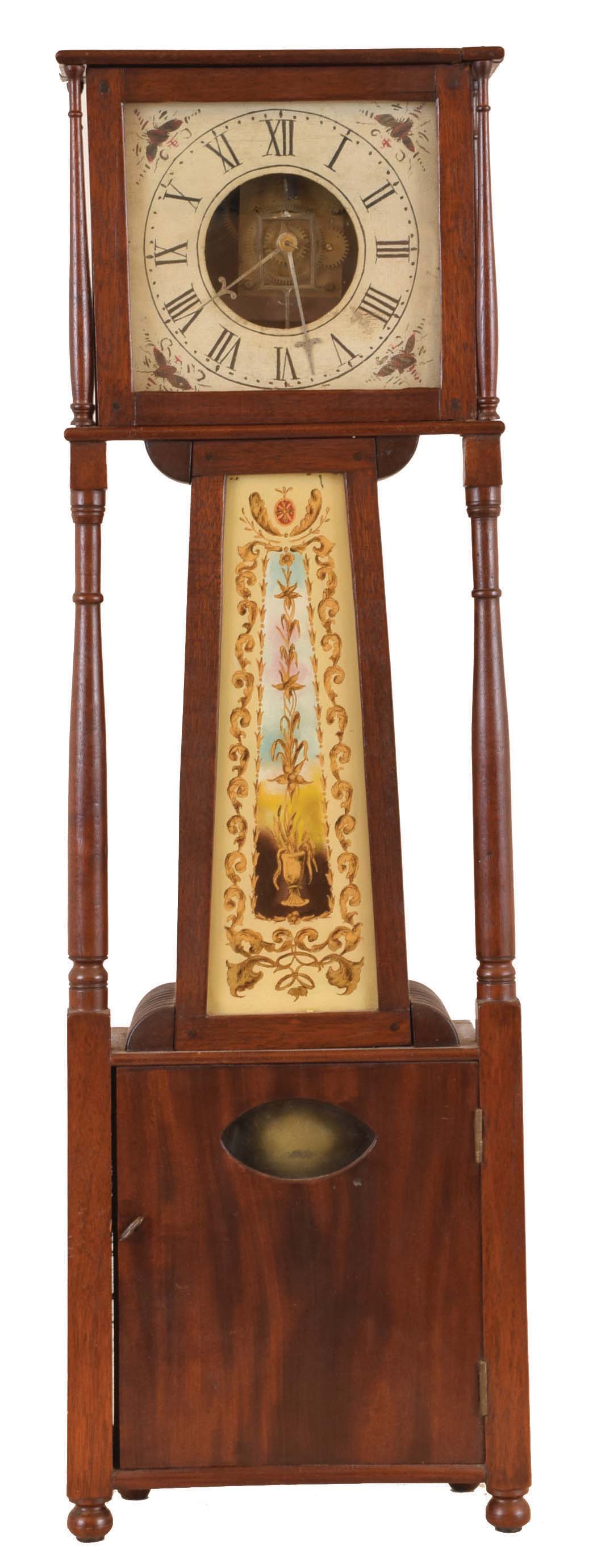 Shelf clock, an unusual banjo derivative, mahogany case with square head and box, on turned feet and with turned columns, the throat sides joined to the upper and lower sections with quarter round, reeded elements, Roman numeral painted dial, reverse painted throat glass, steel hands, 8 day timepiece movement, cast iron weight, 19th century — Antique Clocks Price Guide