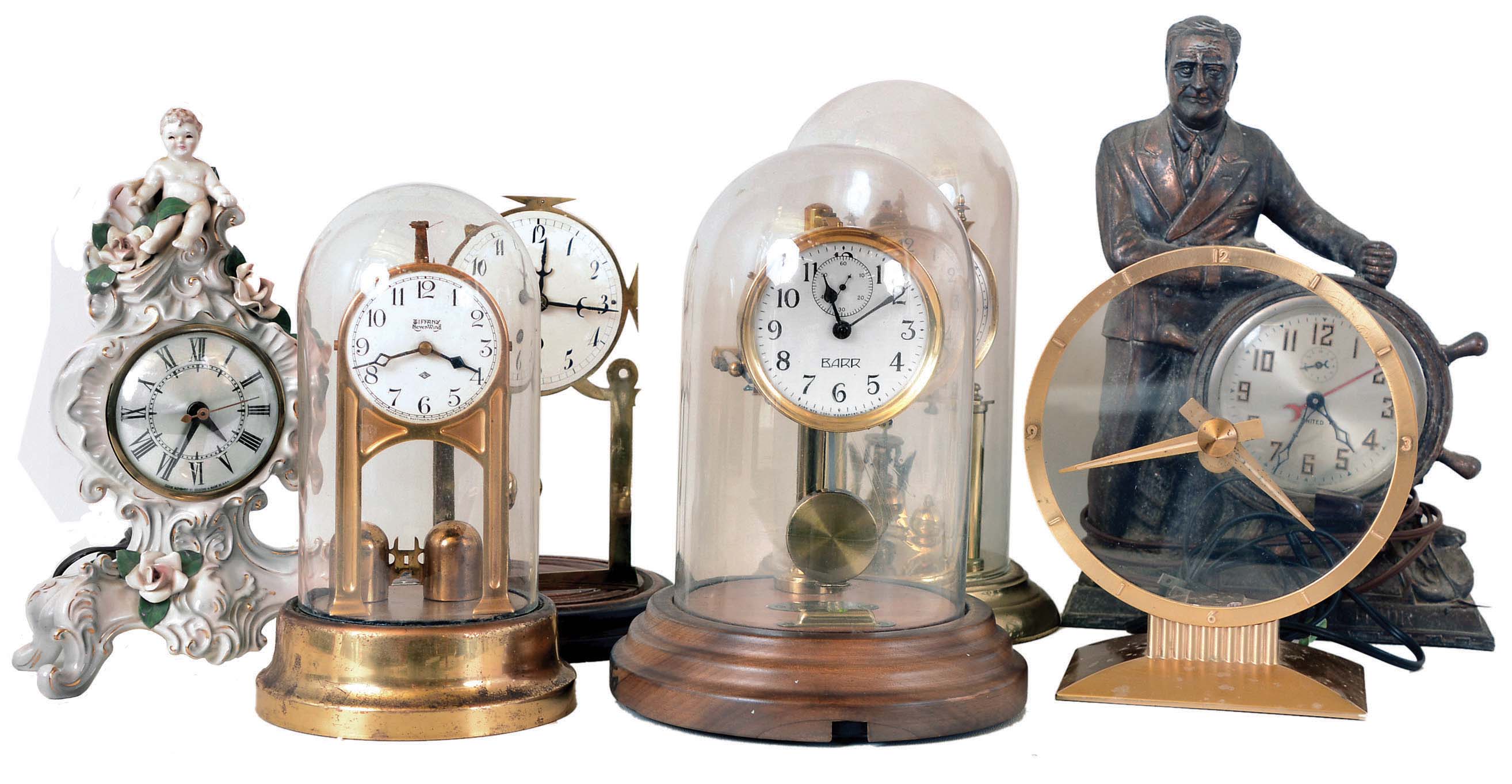 Clocks- 7 (Seven): Jefferson Electric Co., Bellwood, IL "Golden Hour" electric mystery; United Clock Co., Brooklyn, NY FDR electric; German Schatz 400 day; Sessions Clock Co. China electric; Tiffany Never-Wind Clock Co, Buffalo, NY battery-powered; Barr Mfg. Co, Weedsport, NY electro-mechanical; double-pendulum; all 20th century — Antique Clocks Price Guide