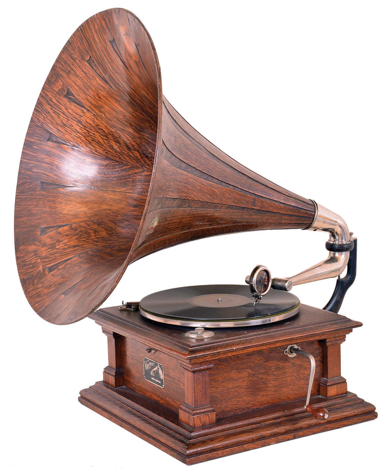 Victor Talking Machine Co., "Type V" oak cased phonograph with original oak horn on an oak and quarter sawn oak record cabinet. — Antique Clocks Price Guide