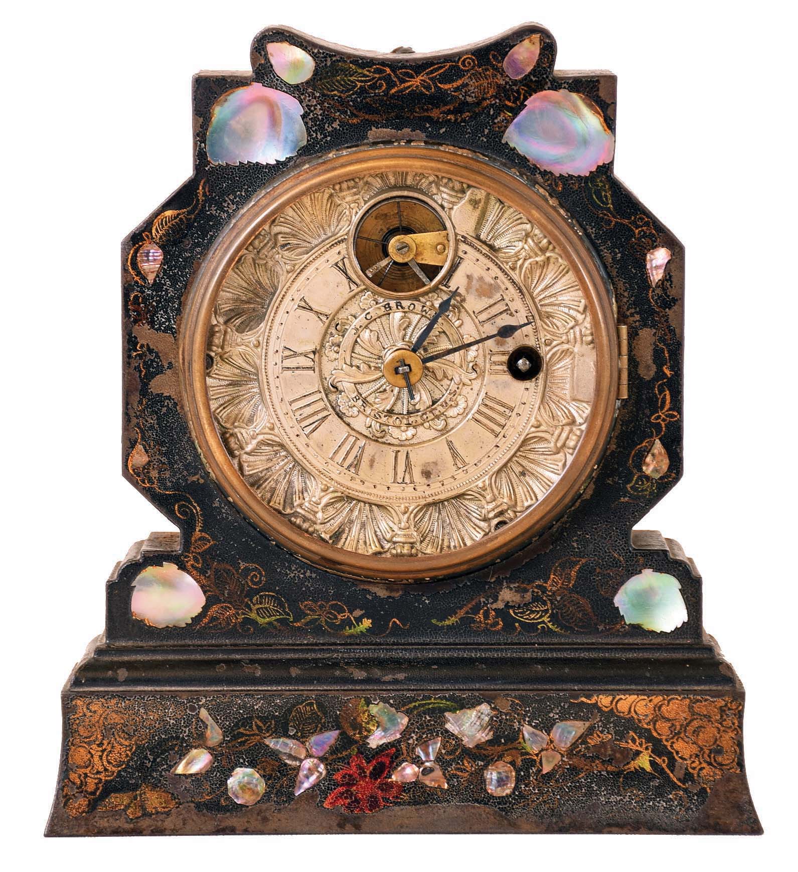 J. C. Brown, Bristol, Conn., shelf clock small painted and gilt line and pearl decorated iron front with Noah Pomeroy balance escapement movement with fancy cast metal silvered dial, stamped with Brown signature — Antique Clocks Price Guide