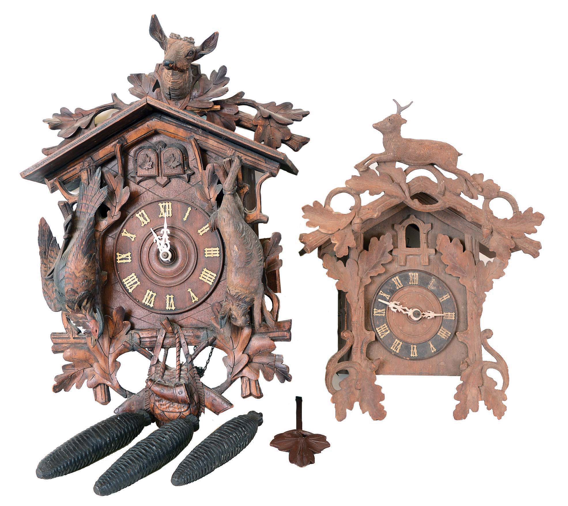 Clocks- 2 (Two) Cuckoo, Germany: ''AF" 3 weight cuckoo and quail with carved bird, stag and rabbit; "GHS" 2 weight with complete carved stag at top; early 20th century — Antique Clocks Price Guide