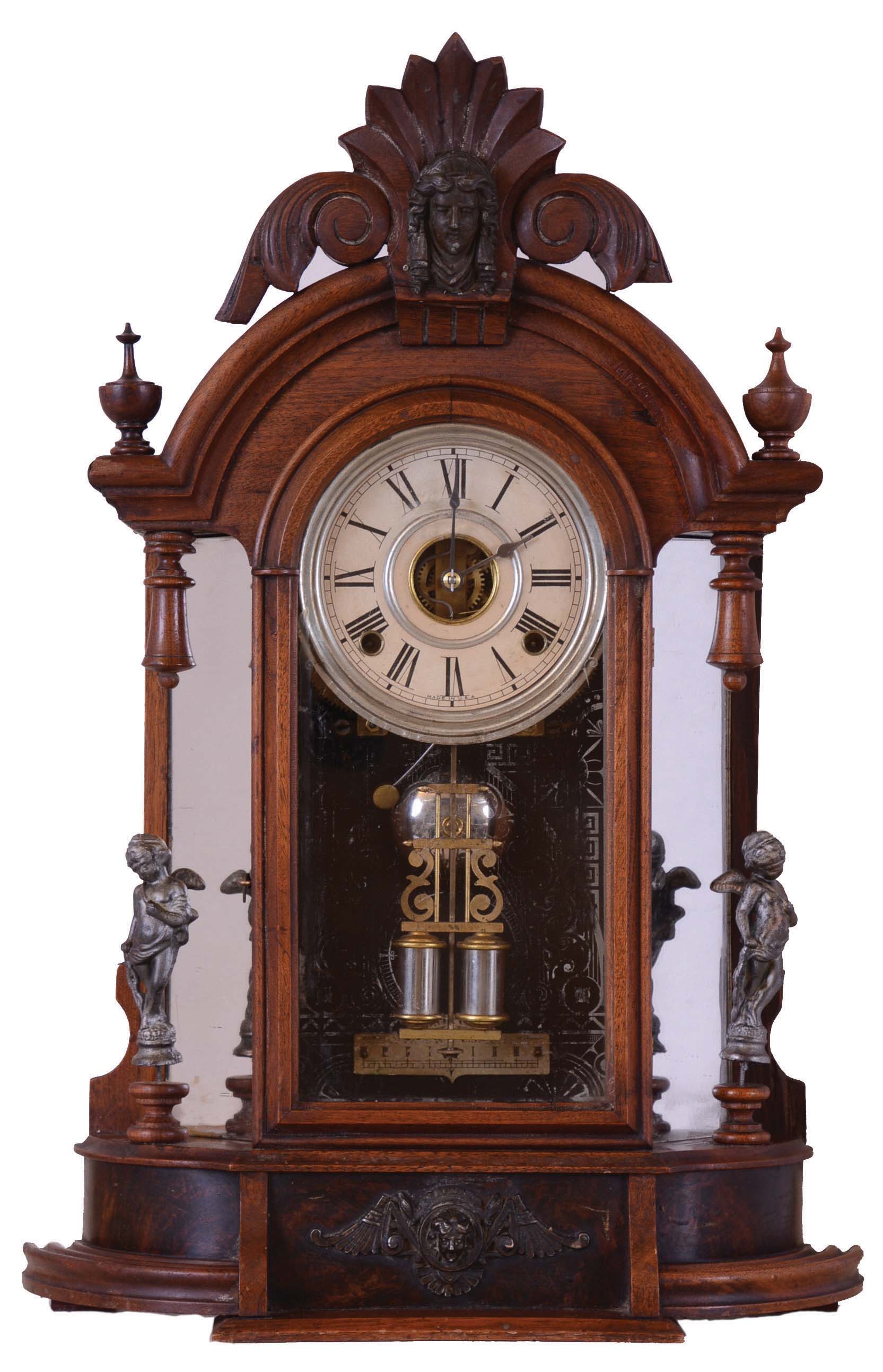 Ansonia Clock Co., New York, NY, "Triumph" mirror side shelf clock with a spring driven 8 day time and strike movement in a walnut case. — Antique Clocks Price Guide