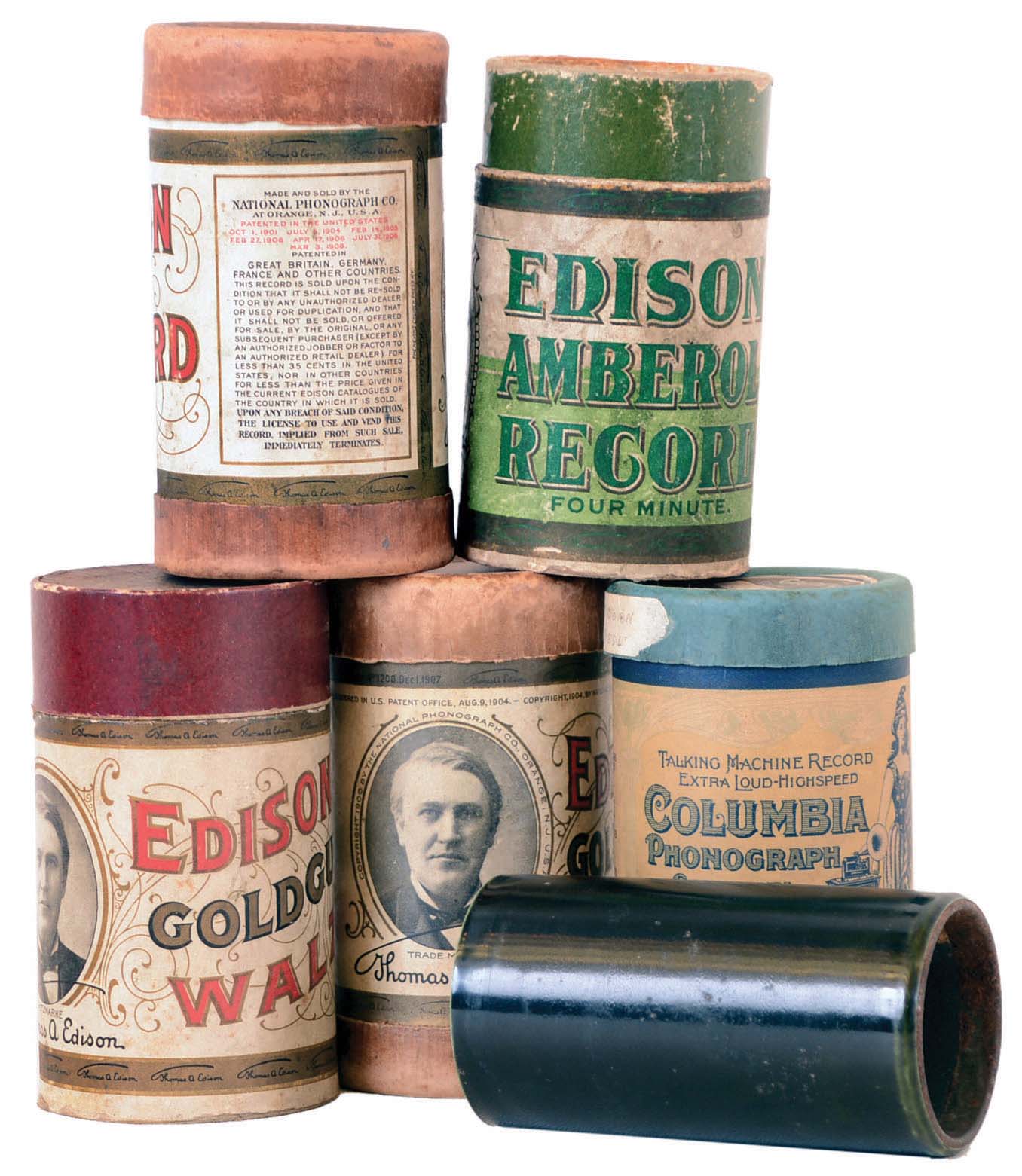 Lot of approximately 98 Edison Blue Amberol 4-minute celluloid cylinders - plus nine 2-minute celluloid cylinders made by Indestructible Oxford, etc. Also 21 Edison 4-minute hard wax records - plus 45 Edison and 2 Columbia 2-minute wax records. A total of 173 good records. Another nine early wax records in poor condition have been added to the box as they may be useful for shaving and recording. — Antique Clocks Price Guide