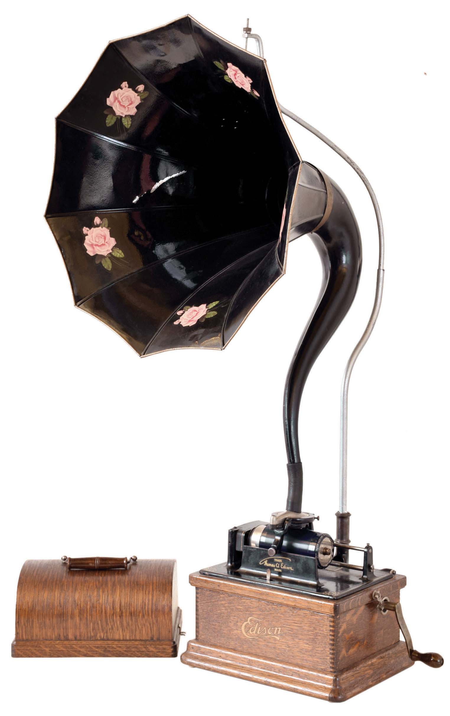 Thomas A. Edison, East Orange, NJ. "Fireside" combination 2 &amp; 4 minute photograph with a cygnet horn, This example has a diamond stylus reproducer now for playing 4-minute Blue Amberol records. — Antique Clocks Price Guide