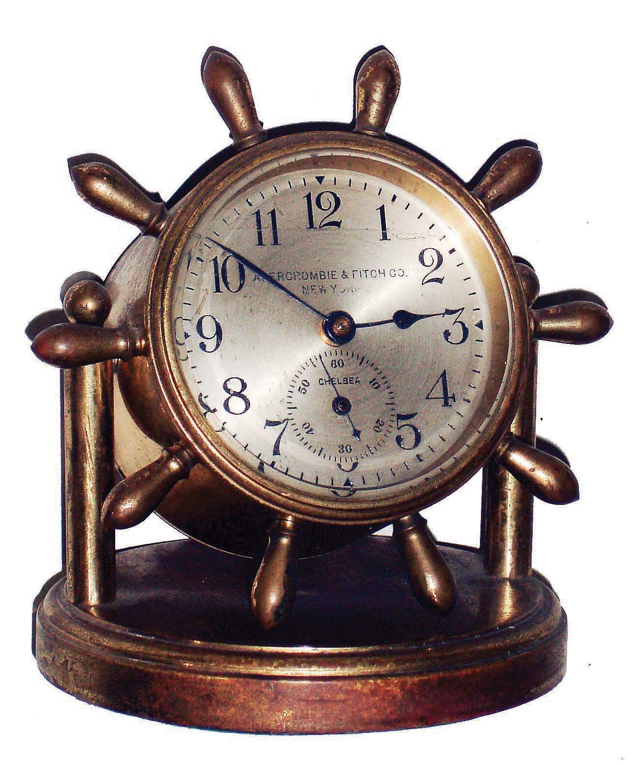 Chelsea Clock Co., Boston, Mass., for Abercrombie &amp; Fitch Co., New York, NY, "Clinton" brass, 8 days, time only swivel head yacht wheel desk clock, 2 3/4" dial, c1930 — Antique Clocks Price Guide