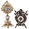 Clocks- 2 (Two) Lenzkirch Clock Co., Germany, mantel clocks: (1) cast brass, 8 day, time only, small mantel clock with strut stand, serial #750551, 1883; (2) Fancy vase form clock with brass stand and decoration. 8 day, time only.