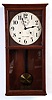 Seth Thomas Clock Co., Thomaston, Conn., "Office No. 16" wall clock with a 30 days spring driven brass timepiece movement (86W) with Graham dead beat escapement in an oak case.