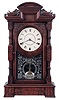 Seth Thomas Clock Co., Thomaston, Conn., "Hecla" shelf clock in a walnut case with a spring driven, 3 train movement striking the hours on a cathedral gong and the quarter hours on two cup bells, c1885.