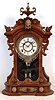 Ansonia Clock Co., New York, NY, "Monarch" shelf clock with an 8 day spring driven brass time & strike movement in a walnut case, c1890.