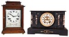 Clocks- 3 (Three) 8 day time and strike mantel clocks, plus mahogany clock shelf: Ansonia "El Falka" marble with visible escapement, c1904; British Jerome mahogany bracket with silvered dial, c1910; New Haven unidentified model walnut kitchen clock with indicator pendulum with shelf, c1885