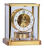 LeCoultre, Switzerland, "Atmos" gold-plated brass and glass mantel clock wound by atmospheric changes, serial #658529.