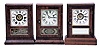 Clocks- 3 (Three): (1) Seth Thomas Clock Co., Plymouth Hollow, Conn., "Cottage" clock with a 30 hours spring driven brass timepiece movement in a rosewood veneered case; c1865. (2) Seth Thomas Clock Co., Thomaston, Conn., "Cottage" clock with a 30 hour spring driven brass time and alarm movement in a rosewood veneered case; c.1875. (3) Seth Thomas Clock Co., Plymouth Hollow, Conn., "Cottage" mantel clock with a 30 hours spring driven time and alarm movement in a rosewood veneered case. c1865.