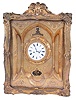 Clocks- 2 (Two) European wall clocks: Austrian gilt-front picture frame 2-day clock, time only thread suspension movement and "F. Einsidl in Wien" music box below; German Black Forest 30 hour shield-dial time and strike weight driven wall clock; mid 19th century