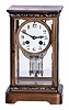 French, 8 days, time and strike spring brass movement crystal regulator with colorful champleve decoration on case and pendulum.