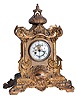 Waterbury Clock Co., Waterbury, Conn., "Chilson" crystal regulator with an 8 days spring driven time and half hour strike movement with visible escapement in a gilt cast spelter case.