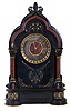 French, black marble & bronze mantel clock, with red marble columns and red trim moldings, and with incised gilt accents, and with 8 day gong strike movement.