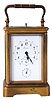 Lepine, a Paris, grand sonnerie striking carriage clock, gilt Corniche case with beveled glasses, Arabic numeral white enamel dial with subsidiary alarm chapter, blued steel hands, 8 day time and strike movement with lever platform, sounding the hour and quarters in passing, and repeating on demand, with lever for selecting grand sonnerie, petit sonnerie, and silence, dial and movement signed, serial #30522