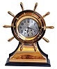 Chelsea Clock Co., Boston, Mass., "Yacht Wheel", 8 days, brass spring lever movement ship's clock. Serial No. 158448. These clocks were offered in Time Only or Ship's Bell when production began in 1906. The clock was Yacht Wheel with the base was named the Mariner. Without the base it was name the "Pilot".
