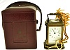 Matthew Norman, Switzerland, "La Vallee" miniature carriage clock, glazed, engraved brass case, Roman numeral white enamel dial, blued steel hands, 11 jewel, 8 day timepiece movement with lever platform, with leather covered travel case