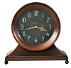 Chelsea Clock Co., Boston, Mass., "Copper Bronze Constitution Ship's Bell Clock" for Bailey, Banks & Biddle, Philadelphia, 8 days, time and ship's bell strike, spring driven movement in a bronze finished brass case on ball feet with large 10" dial with applied silvered numerals and finely wrought hands, serial #34533