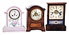 Clocks- 14 (Fourteen) antique: 2 day time and strike 8 day Japanese hanging school clocks; French 8 day time and strike wood tambour mantel clock, dial for Bailey, Banks & Biddle; French porcelain 8 day time and strike mantel, case signed "Gien"; French black marble time and strike 8 day mantel, porcelain dial; New Haven 30 hour time and strike mahogany steeple; German Hamburg-American 8 day time and strike mahogany mantel; English 8 day time only gallery clock (not fusee) ; Sessions walnut 8 day time and strike parlor clock; Waterbury rosewood-veneer 30 hour time, strike and alarm cottage; French 8 day time only carriage clock in leather travel case, cylinder balance; Waterbury rosewood-veneer 30 hour time and strike small spring-wound OG shelf; Ingraham octagon top 30 hour time and strike shelf; Eco Magneto Clock Co., Boston, Mass., oak watchman's time recorder with several paper charts; late 19th and early 20th centuries