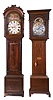 Tall Clocks- 2 (Two) English, 8 days, time and strike, weight driven movements in mahogany veneer cases with second bit's and calendars; one signed "W. Morton, Gamnethan" c1840 and the other by John Holroyd signed "Holroyd, Wakefield" with a brass dial and moon phase, c1780