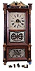Clocks- 3 (Three): (1) Eli Terry & Son, Plymouth Hollow, Conn., Column and Splat shelf clock with a weight driven 30 hours time and strike wooden works in a stenciled mahogany veneered case, c1832. (2) Birge, Peck & Co., Bristol, Conn., Cornice and Column shelf clock with a weight driven 8 days time and strike brass Ives-style strap movement in a mahogany veneered case. c1855. (3) Forestville Manufacturing Co., Bristol, Conn., 8 days, time and strike weight brass movement double decker shelf clock. c1845.