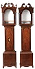 Tall Clock Cases Only- 2 (Two) professionally bench made with broken arch top, tombstone door, fluted corner columns on cutout bracket feet; one with shell inlay on door and brass finials