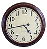 Seth Thomas Clock Co., Thomaston, Conn., "Gallery 24 Inch", wall clock, 15 days, time only, double spring driven movement in a stepped round mahogany case with a, painted zinc dial.