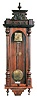 Clocks- 2 (Two) German Gustav Becker walnut 8 day 2 weight Vienna regulator wall clocks, #1365171 and #2262724; late 19th and early 20th centuries