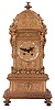 Vincenti & Cie, Paris, France brass architectural mantel clock, 8 days, time and bell strike, spring driven movement with silk thread suspension in a stepped turret type case with pagoda top and profuse fancy cast brass trim and moldings. The brass dial has twelve small Roman numeral cartouches.