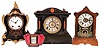 Clocks- 4 (Four): Philip Haas & Sohne German 30 hour time and alarm grain painted cottage clock; Seth Thomas black enamel wood 8 day time and strike mantel; Waterbury "Speck" 30 hour time only carriage clock with carrying case; and Seth Thomas black enameled wood Neuchatel style 8 day time and strike mantel; early 20th century