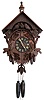 Clocks- 2 (Two) German Black Forest carved walnut and oak 2 weight 30 hour cuckoo wall clocks with birds: one movement stamped "Schwarzw.Ind.Ausstellung, Freiburg, Baden"; other with two pairs of birds has running rabbit brass pendulum hanger; early 20th century