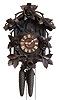 Clocks- 2 (Two) German Black Forest 2 weight 30 hour carved wood cuckoo wall clocks: Furderer Jaegler with lyre plates and carved roses; one indistinctly signed on side door, with standing goat top; late 19th century