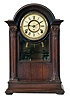 F. Kroeber Clock Co., New York, NY, 8 day mantel clock with multiple bell chiming strike in mahogany case with two part enmael dial.