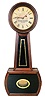 Howard & Davis, Boston, Mass., "No. 3 Regulator" for W.H.C. Riggs. Philadelphia, banjo wall clock, 8 days, time only, weight driven movement in a rosewood grain painted case with papered metal dial and reverse painted black and gold throat and lower tablets