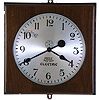 Clocks- 2 (Two) electric: (1) Poole Mfg. Co., Ithaca, NY, "Reliance" wall hanging clock with a battery driven timepiece movement in a square walnut case.. c1940. (2) Self-Winding Clock Company, New York, "Naval Observatory Time, Western Union" electrically wound gallery wall clock, c1930.