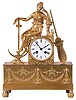 France, mantel clock, gilt bronze case with oblong base with engine turned feet, the front with applied floral swags and anchors, surmounted by a female figure in a contemplative pose, and resting her arms on an anchor and cornucopia, Roman numeral white enamel dial with partial signature, blued steel hands, 8 day time and strike pendule a Paris movement