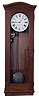 Standard Electric Time Co., Springfield, Mass., "Master Clock", time only, electrical driven movement in a mahogany case with a brass pendulum bob and painted metal dial and program module located under dial