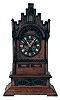 Samuel Kammer, Germany, Gothic style shelf cuckoo, the architectural oak case with turned columns, turrets, carved Gothic foils and fretwork, crenellated parapet and gable, on a heavy, ogee molded base, turned wooden dial with applied Roman numerals, carved bone hands, 8 day, pierced brass time and strike movement, with fusee for time train and going barrel for striking