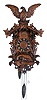 German 30 hours, carved walnut cuckoo clock, "Lion of Lucerne" motif commemorating the 1792 massacre of Swiss guards during the French revolution