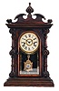 Welch, Spring & Co., Forestville, Conn., "Cary VP" mantel clock with an 8 day spring driven time and strike with "Patti"-style movement in a rosewood and rosewood veneered case.